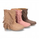 Suede leather boot shoes with fringed detail for toddler girls.