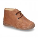 Little ankle boots in tanned nappa leather for kids.