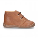 Little ankle boots in tanned nappa leather for kids.