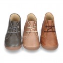 Little ankle boots in tanned nappa leather for kids.