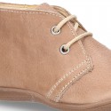 Little ankle boots in tanned nappa leather for kids.