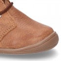 Little ankle boots in tanned nappa leather for kids.