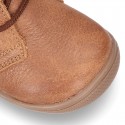 Little ankle boots in tanned nappa leather for kids.