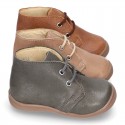 Little ankle boots in tanned nappa leather for kids.