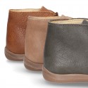 Little ankle boots in tanned nappa leather for kids.