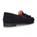 Classic suede leather moccasins with tassels and thick soles.