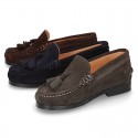 Classic suede leather moccasins with tassels and thick soles.