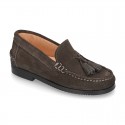 Classic suede leather moccasins with tassels and thick soles.