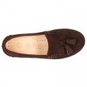 Classic suede leather moccasins with tassels and thick soles.