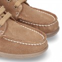 New Moccasin style ankle boots in suede leather.