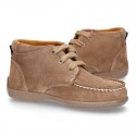 New Moccasin style ankle boots in suede leather.