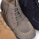 MOHICAN style ankle boots with fringed design in suede leather.