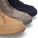 MOHICAN style ankle boots with fringed design in suede leather.