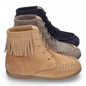 MOHICAN style ankle boots with fringed design in suede leather.