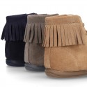 MOHICAN style ankle boots with fringed design in suede leather.