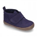 New Casual Suede leather ankle boots with velcro strap and fake hair lining.