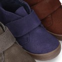 New Casual Suede leather ankle boots with velcro strap and fake hair lining.