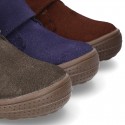 New Casual Suede leather ankle boots with velcro strap and fake hair lining.