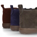 New Casual Suede leather ankle boots with velcro strap and fake hair lining.