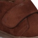 New Casual Suede leather ankle boots with velcro strap and fake hair lining.