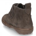 New Casual Suede leather ankle boots with velcro strap and fake hair lining.