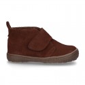 New Casual Suede leather ankle boots with velcro strap and fake hair lining.