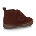 New Casual Suede leather ankle boots with velcro strap and fake hair lining.