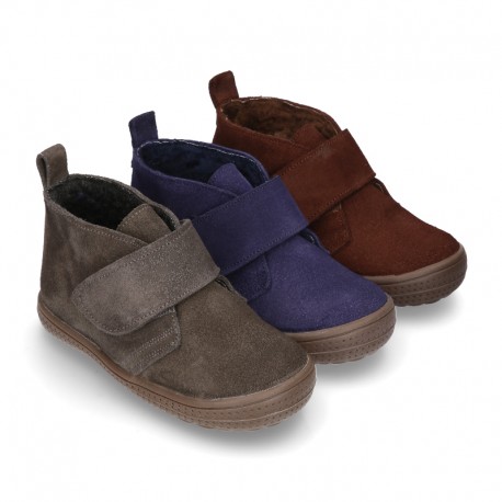 New Casual Suede leather ankle boots with velcro strap and fake hair lining.