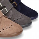 New Classic suede leather little bootie Oxford style with velcro strap and chopped design.