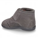 New Classic suede leather little bootie Oxford style with velcro strap and chopped design.