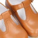 New Classic Nappa Leather T-strap shoes with buckle fastening in cowhide color.