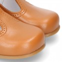 New Classic Nappa Leather T-strap shoes with buckle fastening in cowhide color.