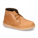 Classic kids Safari boots with faux fur lining in tanned nappa leather.