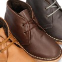 Classic kids Safari boots with faux fur lining in tanned nappa leather.