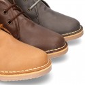 Classic kids Safari boots with faux fur lining in tanned nappa leather.