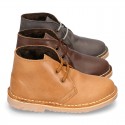 Classic kids Safari boots with faux fur lining in tanned nappa leather.