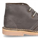 Classic kids Safari boots with faux fur lining in tanned nappa leather.