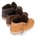 Classic kids Safari boots with faux fur lining in tanned nappa leather.