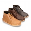 Classic kids Safari boots with faux fur lining in tanned nappa leather.