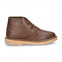 Classic kids Safari boots with faux fur lining in tanned nappa leather.