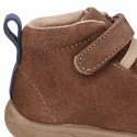 New suede leather ankle boots with elastic shoelaces design, velcro strap and toe cap.