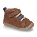 New suede leather ankle boots with elastic shoelaces design, velcro strap and toe cap.