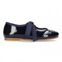 Patent leather Angle style ballet flat or Mary Jane shoes.