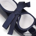Patent leather Angle style ballet flat or Mary Jane shoes.