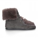 New Medium height ankle boots with FAKE HAIR design in suede leather.