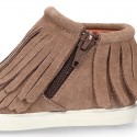 New Sneaker style ankle boots with fringed design in suede leather.