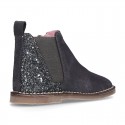 New ankle boots with elastic band and zipper closure with GLITTER counter.