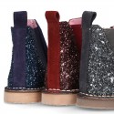 New ankle boots with elastic band and zipper closure with GLITTER counter.