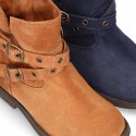 Suede leather ankle boots countryside style with buckles design.