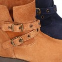 Suede leather ankle boots countryside style with buckles design.